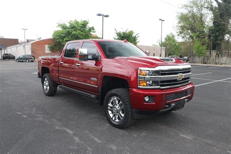 Chevy 2500hd high country for sale - Mileage: 43,846 miles Color: Black Body Style: Pickup Engine: 8 Cyl 6.6 L Transmission: Automatic. Description: Used 2018 Chevrolet Silverado 2500HD High Country with Four-Wheel Drive, Cooled Seats, Running Boards, Bucket Seats, Leather Seats, Bed Liner, Remote Start, Trailer Wiring, Limited Slip Differential, Trailer Hitch, and Heated Seats. 